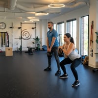 Physical therapist providing personalized one-on-one performance physical therapy to an athlete in Farmers Branch