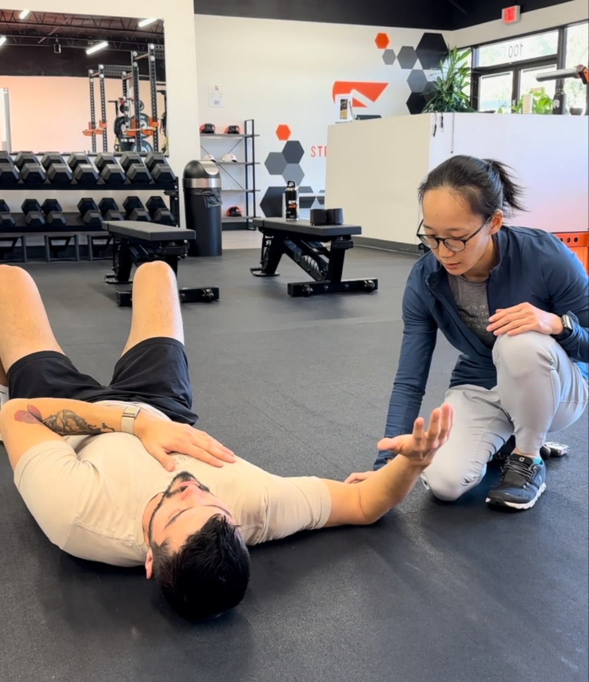 Active adult performing strength training exercises during physical therapy session at Grit PT in North Dallas, TX